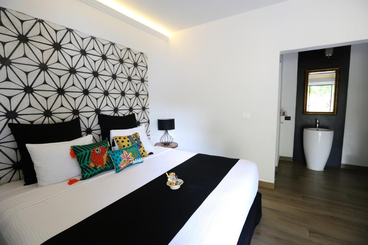 Casa Chukum Hotel Bacalar Exterior photo A bedroom at the hotel