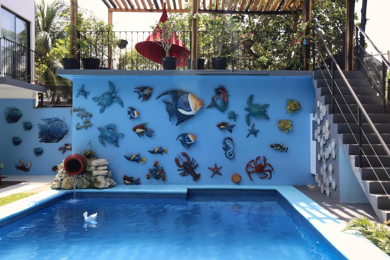 Casa Chukum Hotel Bacalar Exterior photo The pool at the home of the artist